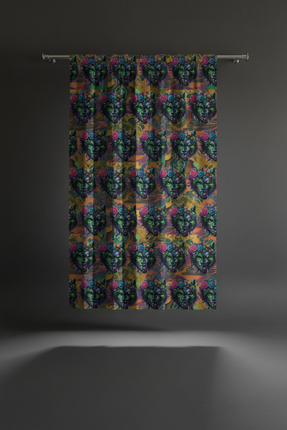 Colorful patterned fabric hanging on a rod against a dark background
