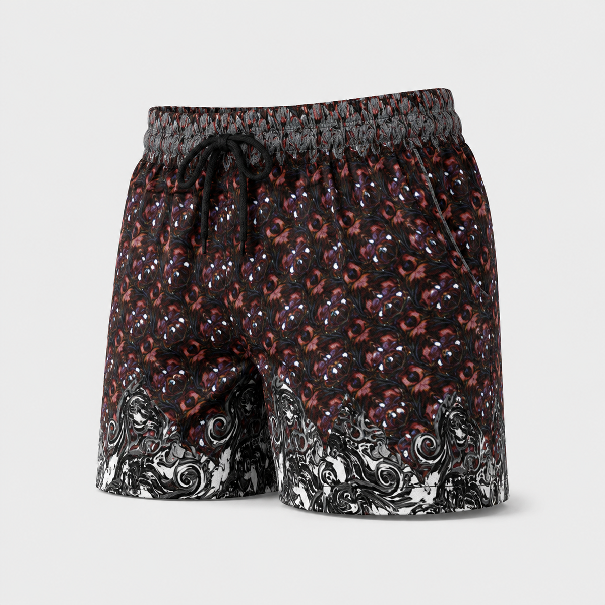 A pair of men's swim trunks featuring a black base with a red and white patterned print, a gray elastic waistband, and a black drawstring, set against a light gray background.
