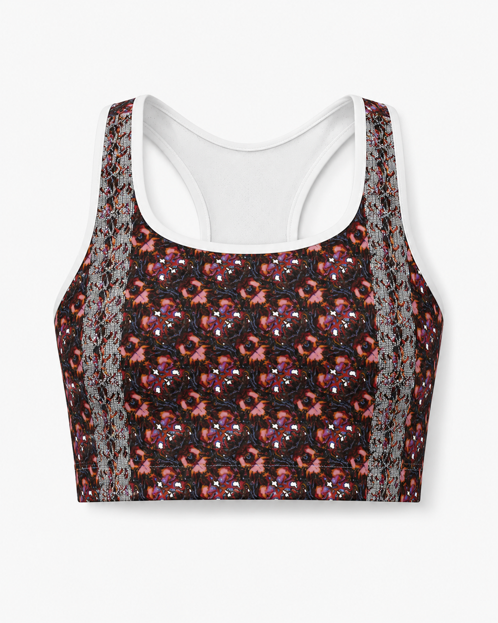 A women's sports bra with a black base featuring a dense red and pink floral pattern, detailed with gray lace-like vertical side panels and a white racerback neckline.