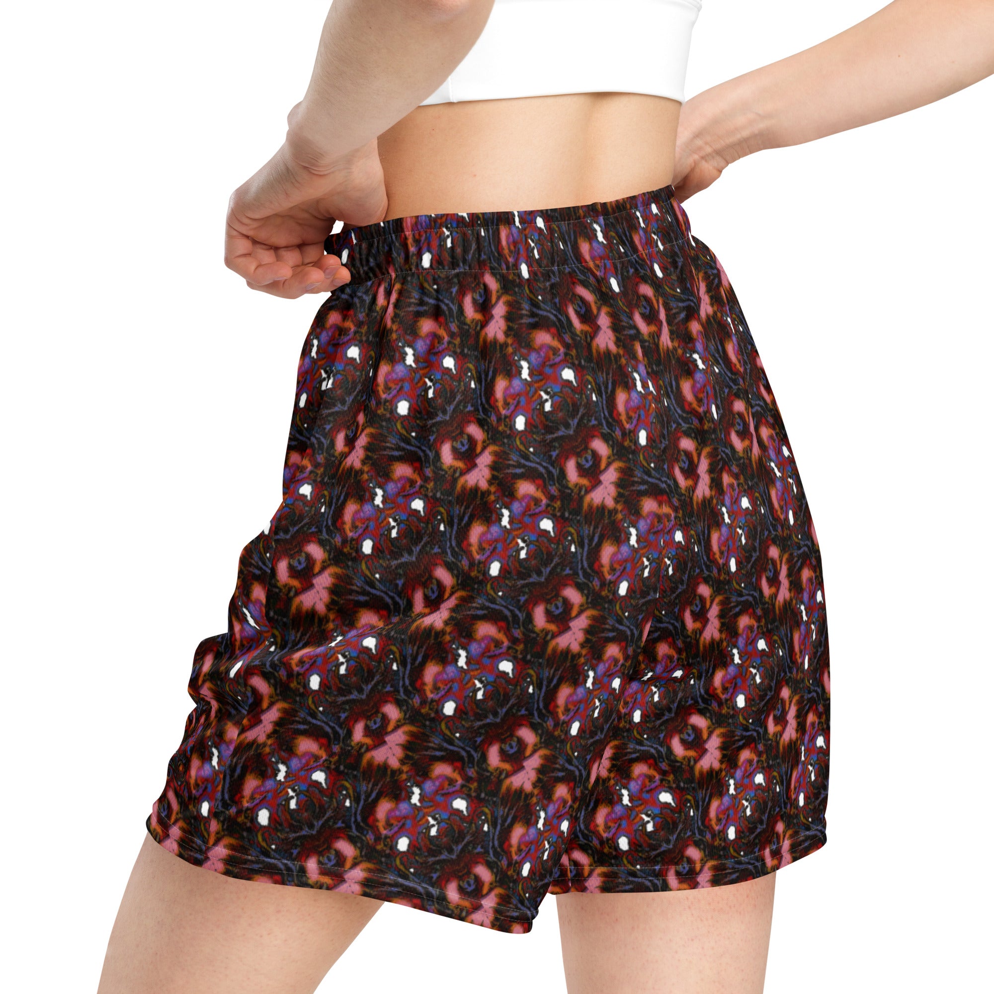 Person wearing a patterned skirt on a white background