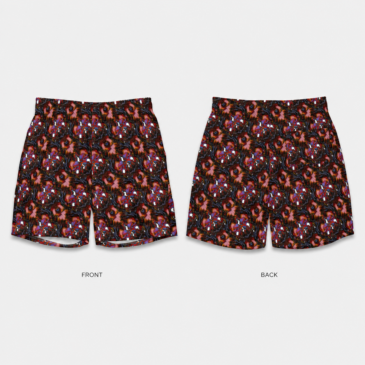 Front and back views of athletic shorts featuring a dense, colorful abstract floral pattern on a black background, displayed against a light gray studio backdrop.