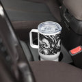 Marbled patterned tumbler in a car cup holder