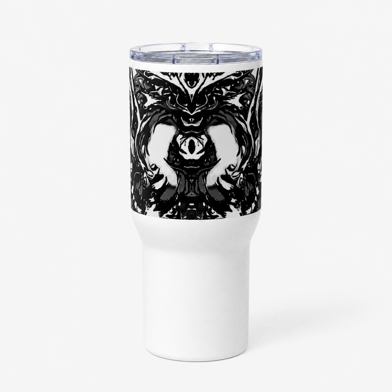 A white insulated travel tumbler with a clear lid, featuring a black and white symmetrical gothic graphic print on the upper half, shown against a plain white background.