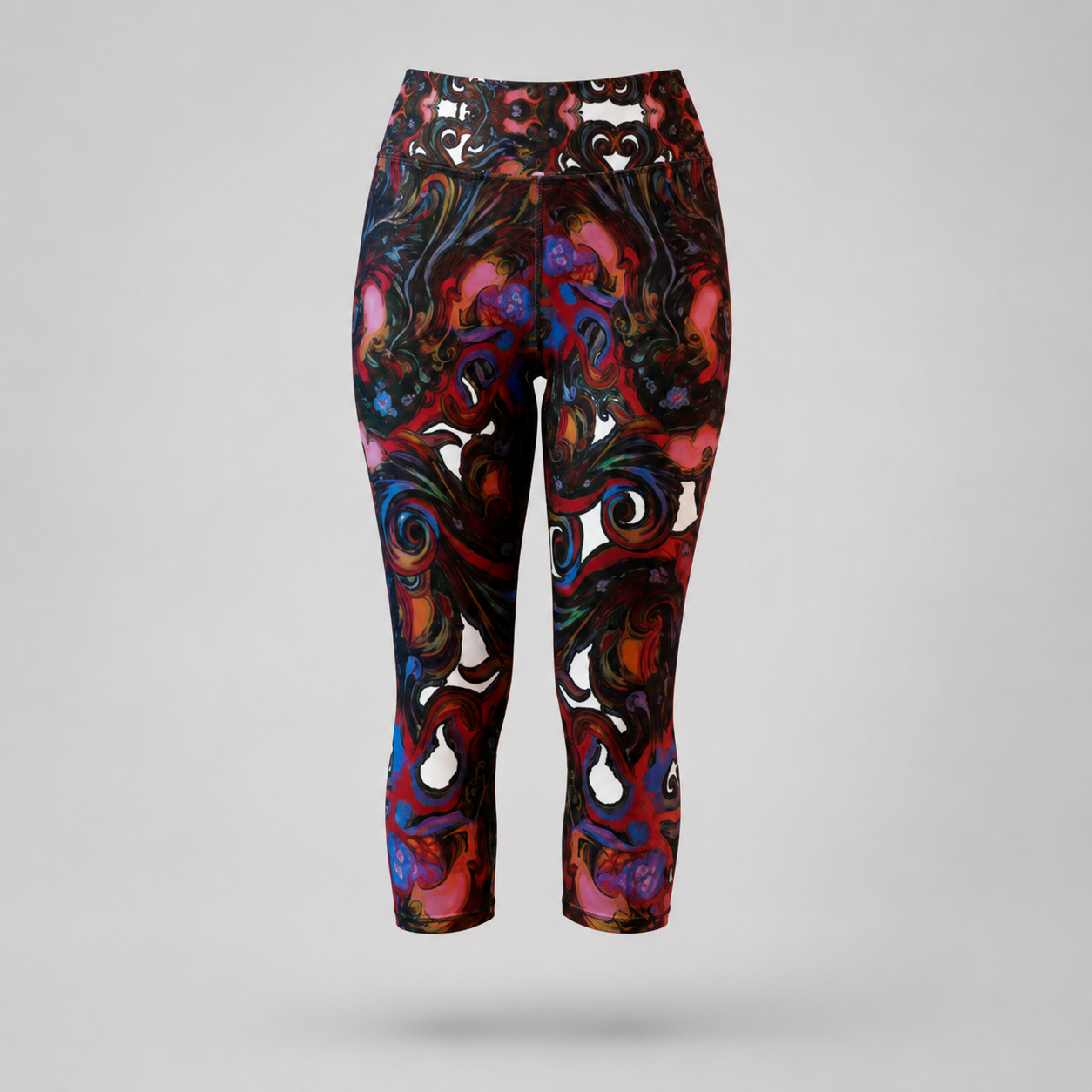 High-waisted capri leggings with an intricate, swirling abstract pattern in red, blue, purple, black, and white, shown against a neutral gray background.