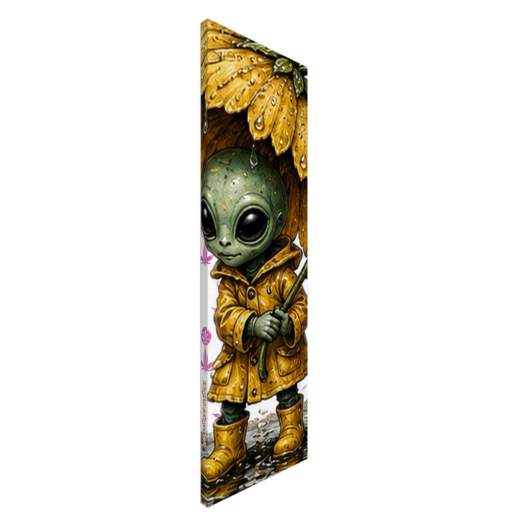 A tall, narrow vertical art print or poster featuring a cute green alien wearing a mustard yellow raincoat and holding a matching yellow umbrella with water droplets, shown against a plain white background.