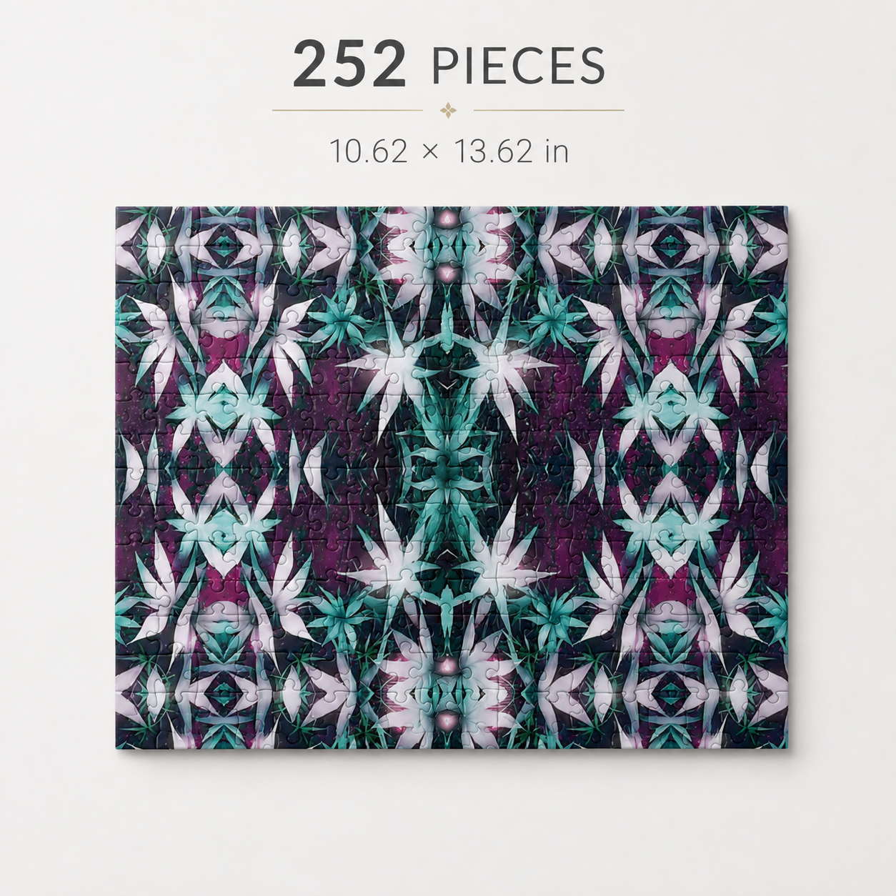 A completed jigsaw puzzle with a symmetrical floral pattern in purple, teal, and white, shown on a light gray background with text above reading '252 PIECES' and '10.62 x 13.