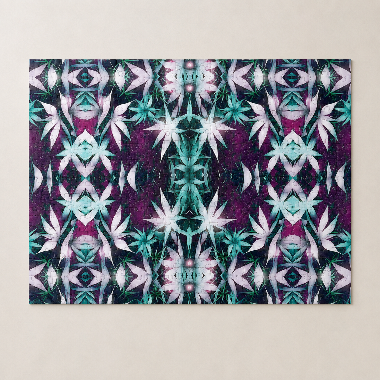 A completed jigsaw puzzle featuring a symmetrical, kaleidoscopic abstract pattern in purple, teal, white, and black, displayed flat against a light beige background.