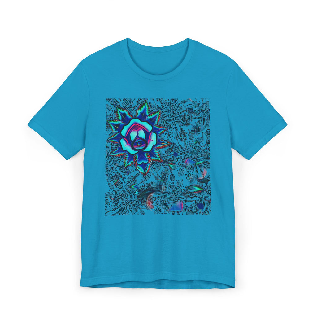 A bright turquoise blue short-sleeve t-shirt with a large square graphic print on the front. The graphic features a stylized neon flower with pink, purple, and blue tones set against a dark, intricate abstract background.