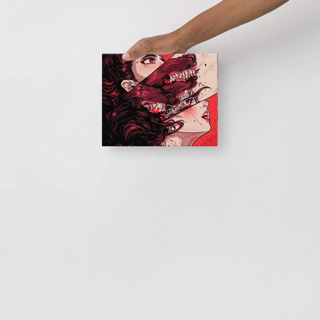 Hand holding a box with a graphic design of a woman with red hair and a creature's face.