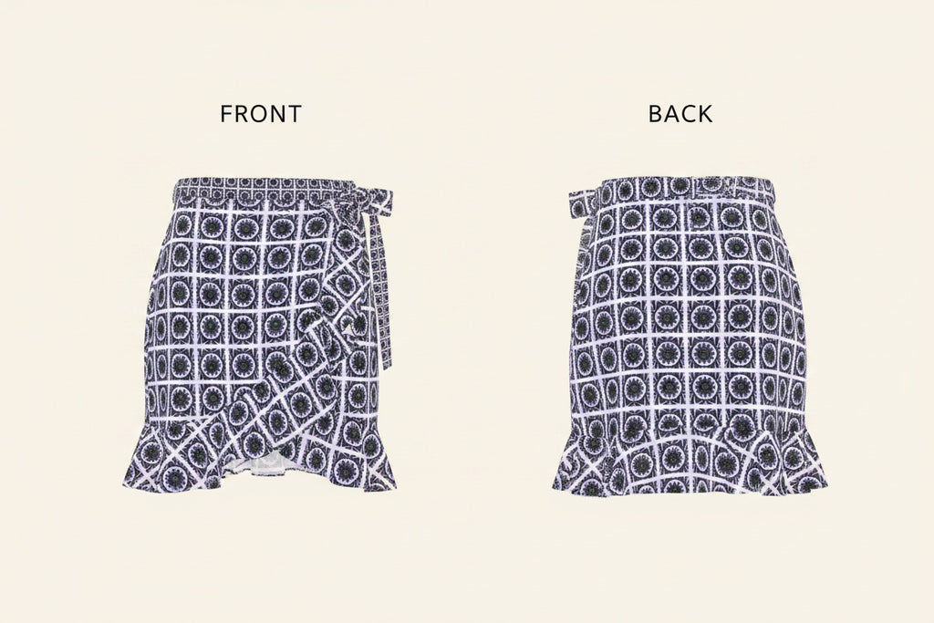 A ruffled mini skirt with an all-over geometric pattern in navy blue and white, featuring a drawstring waist and side cutouts.