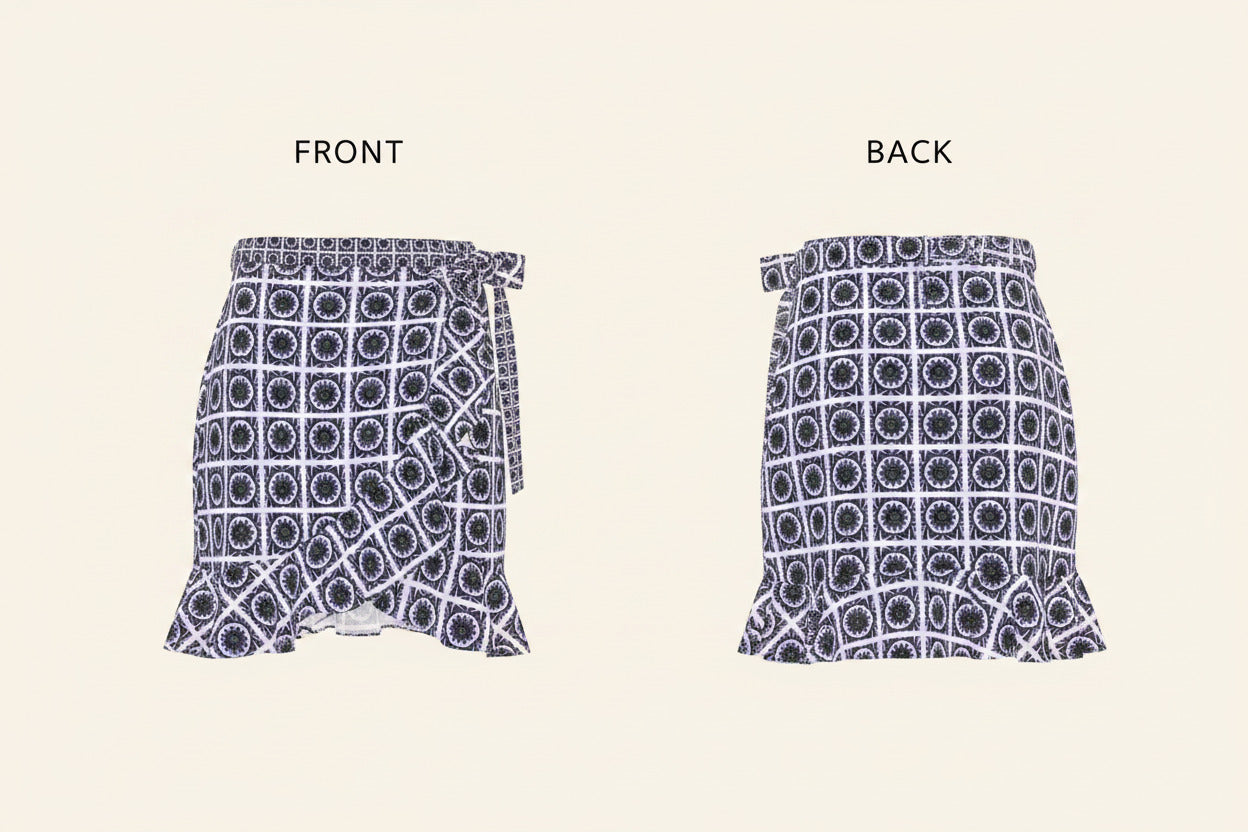 A ruffled mini skirt with an all-over geometric pattern in navy blue and white, featuring a drawstring waist and side cutouts.