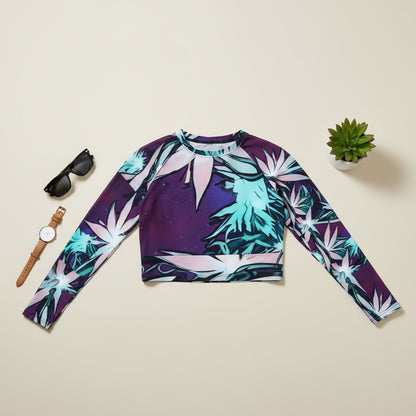 Woman wearing a colorful long-sleeve top with a floral pattern against a beige background