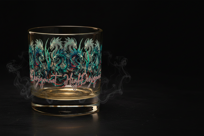 Decorative glass with floral design and 'High Departure' text on a dark background