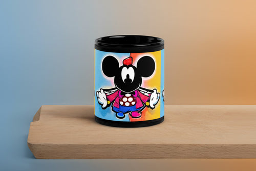 A colorful ceramic mug with a cartoon character design.
